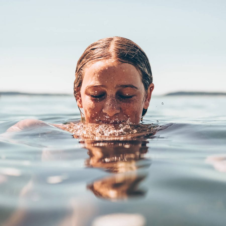 Picture of woman's face swimming in the sea