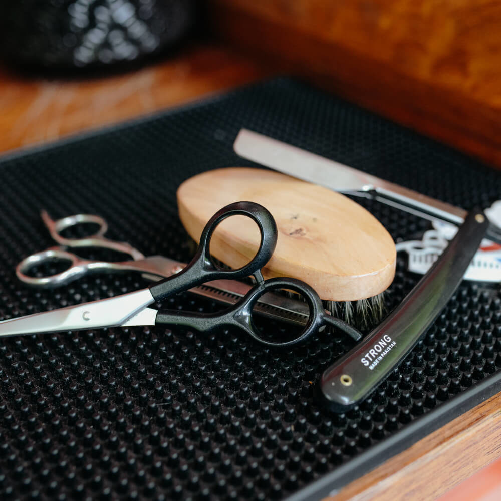 Picture of barber scissors and tools