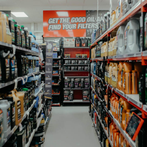 Picture of aisle filled with different types of oil