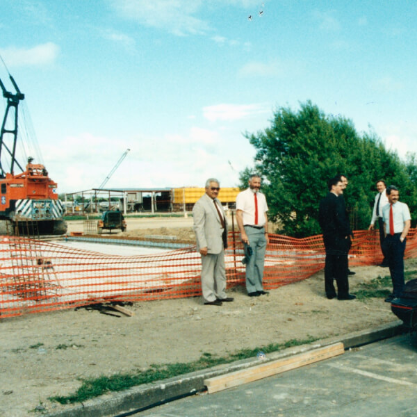 Picture of men standing in construction site